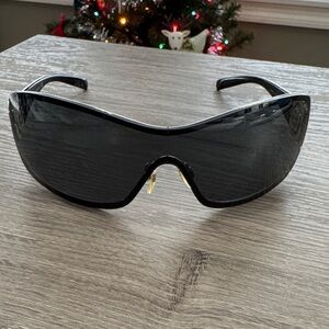 CHANEL Black Sunglasses with Silver Floral Detail